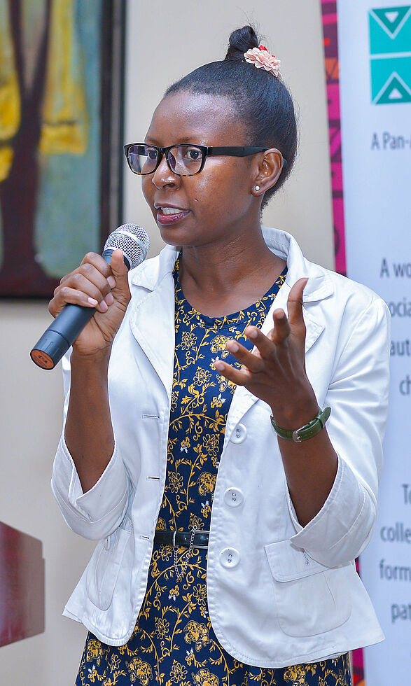 Dr. Madina Guloba makes  her presentation on “Gender in Social Protection in Uganda”| Photo: AMWA