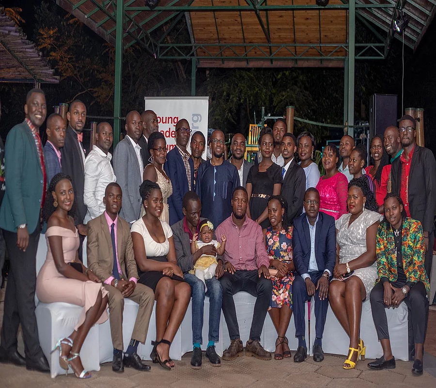 This photograph shows a group of young professionals who have gathered at the Young Leaders Forum in Uganda.